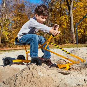 Boy digging in a sandpit on The Big Dig and Roll