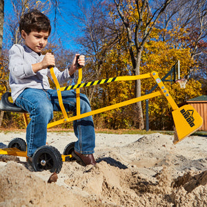 Boy on a Big Dig and Roll in a sandpit