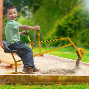Boy on a Big Dig at a playground